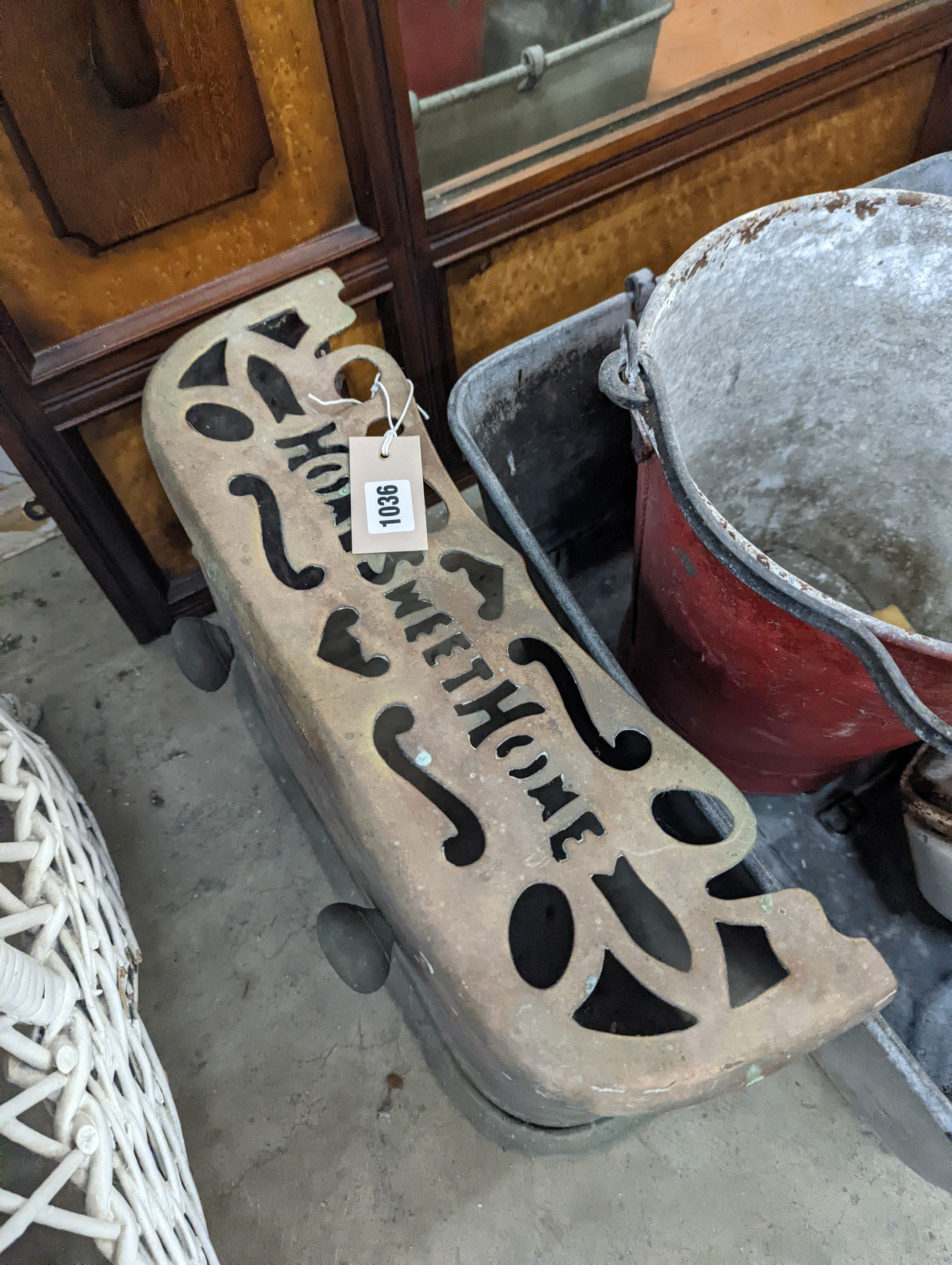 A rectangular galvanised tub, scales bucket, fender, etc.